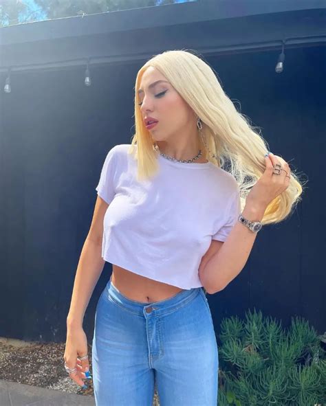 ava max sexy|Ava Max flaunts her incredible figure in a VERY busty red bikini.